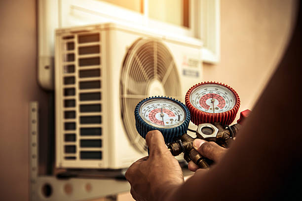 Professional Air Conditioning Service technician working in West End, NC